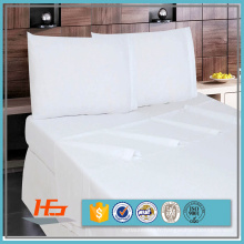 Le lit simple blanc en gros couvre les ensembles blancs de feuille de jumeau pour des hôpitaux et des hôtels